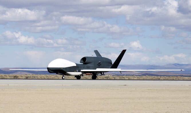 Global Hawk unmanned aerial vehicle number three returns home to Edwards Air Force Base, Calif., on  Feb. 20, 2006, after a three-year deployment supporting  the war on terrorism. Air Force officials recently testified before the House Armed Services Committee about the success of the UAV in transforming battlespace. (U.S. Air Force photo/Chad Bellay)