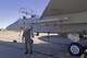EGLIN AIR FORCE BASE, Fla.  — Lt. Col. Glenn Graham, 40th Flight Test Squadron commander, inspects the P5 Combat Training System before taking it out on a flight test.  (Photo courtesy of Cubic Corporation)

