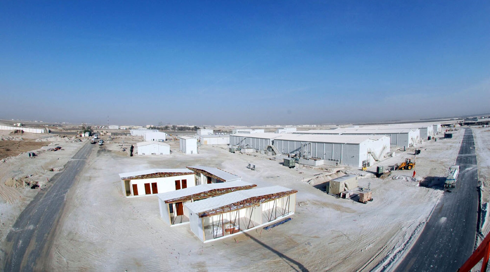 SOUTHWEST ASIA (AFPN) -- From a bird's eyes view the new Temporary Cantonment Area for the 380th Air Expeditionary Wing begins to take shape. Units with the Wing are expected to move into the new facilities in April. (U.S. Air Force photo by Joey Shumate)