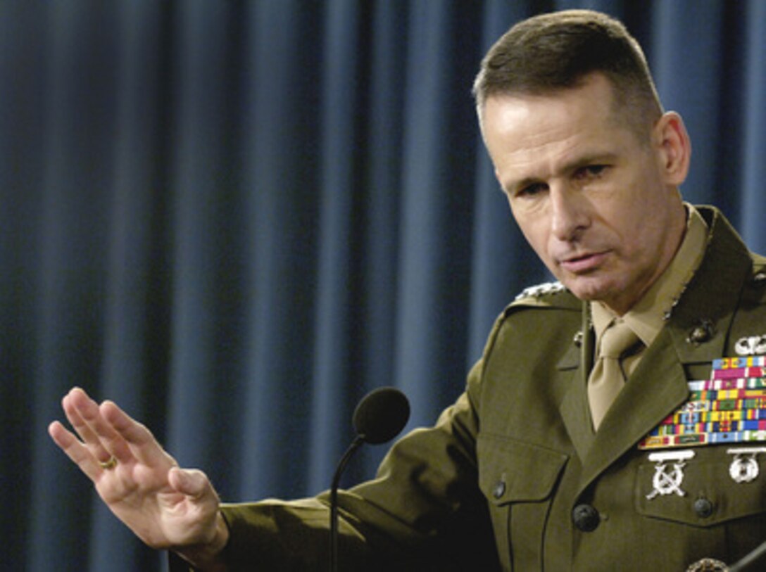 Chairman of the Joint Chiefs of Staff Gen. Peter Pace, U.S. Marine Corps, answers a reporter's question during a Pentagon press briefing in Arlington, Va., on Feb. 21, 2006. Pace joined Secretary of Defense Donald H. Rumsfeld in talking to reporters about the DoD rescue and relief efforts in the Guinsaugon, Philippines mudslide disaster and the global war on terrorism. 