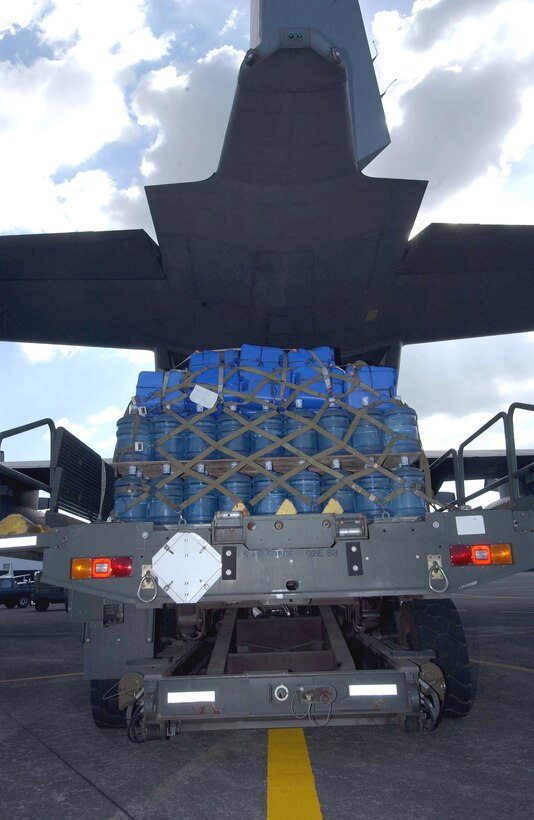 CLARK AIR BASE, Philippines (AFPN) -- Bottled water waits to be loaded onto a C-130 Hercules Feb. 20.  Water and other relief supplies are being brought to Tacloban, a city on the northwestern part of the island of Leyte, where U.S. and Philippine armed forces are working together to help victims of the Feb. 17 landslide in the village of Guinsaugon.  (U.S. Air Force photo by Staff Sgt. Joselito Aribuabo)