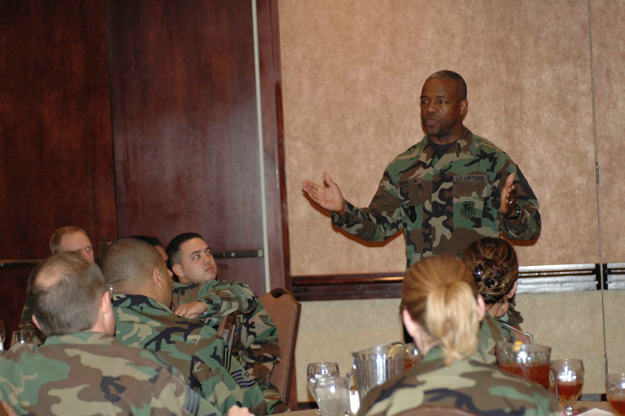 Chief Master Sgt. Brye McMillon, 60th Air Mobility Wing command chief, speaks to Travis members about force shaping during the first Enlisted Mentorship Luncheon Feb. 1 at the Delta Breeze Club. The purpose of the forum was to give senior and junior enlisted members an opportunity to communicate and discuss major issues affecting the force. (U.S. Air Force photo by Airman 1st Class Tiffany Low)