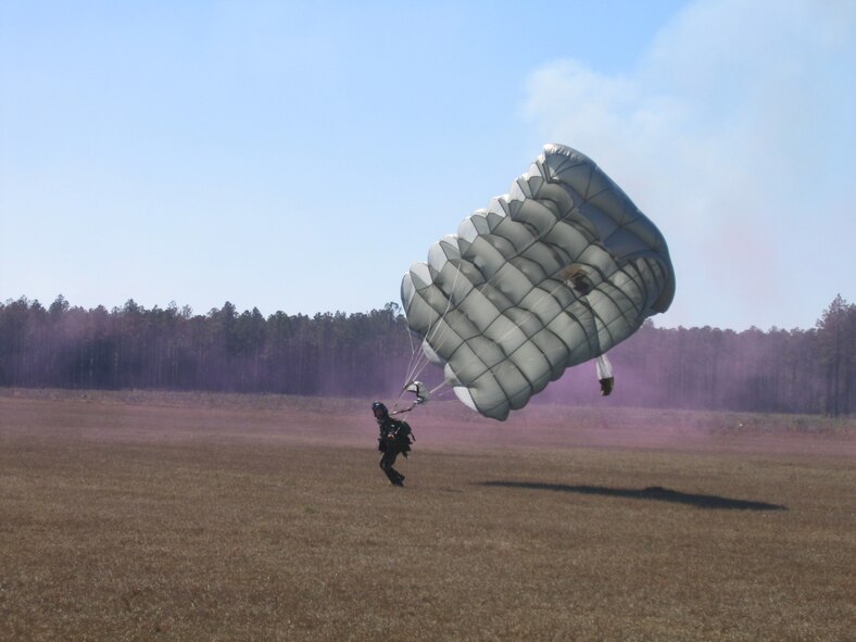 MOODY AIR FORCE BASE, Ga. - A 38th Rescue Squadron pararescueman lands on the Bemiss Range, Feb. 16, after performing a high-altitude, low-opening jump out of a 71st RQS HC-130P/N during a combat search and rescue scenario as part of the Moody “war” exercise. (Photo by Airman Eric Schloeffel)
