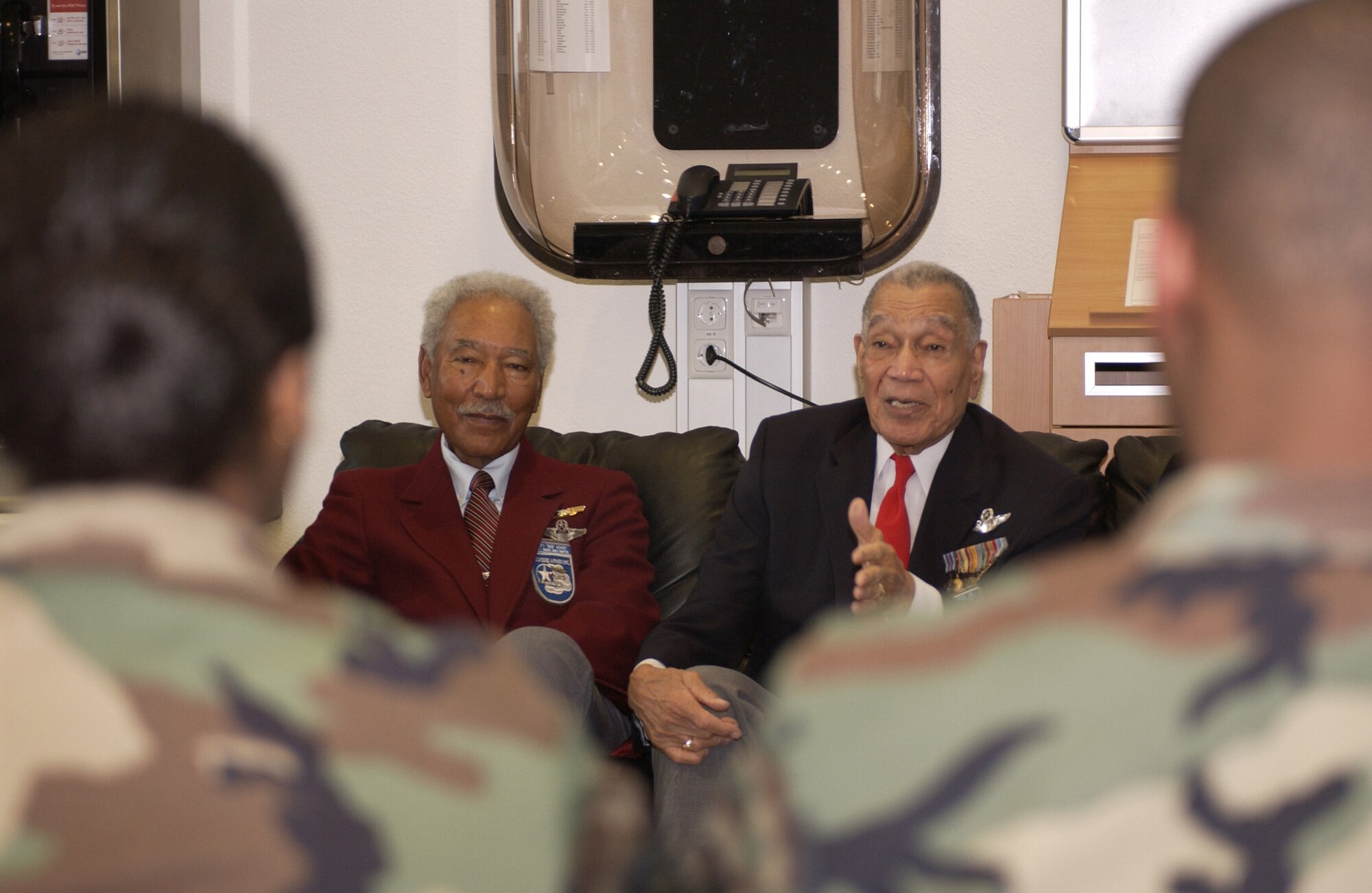 SPANGDAHLEM AIR BASE, Germany (AFPN) -- Retired Lieutenant Colonels Robert Ashby and Lee Archer, members of the original Tuskegee Airmen, visit the 726th Air Mobility Squadron. The Tuskegee Airmen visited the base Feb. 21 as part of the celebration of African-American History Month. (U.S. Air Force photo by Senior Airman Kristin Ruleau)
