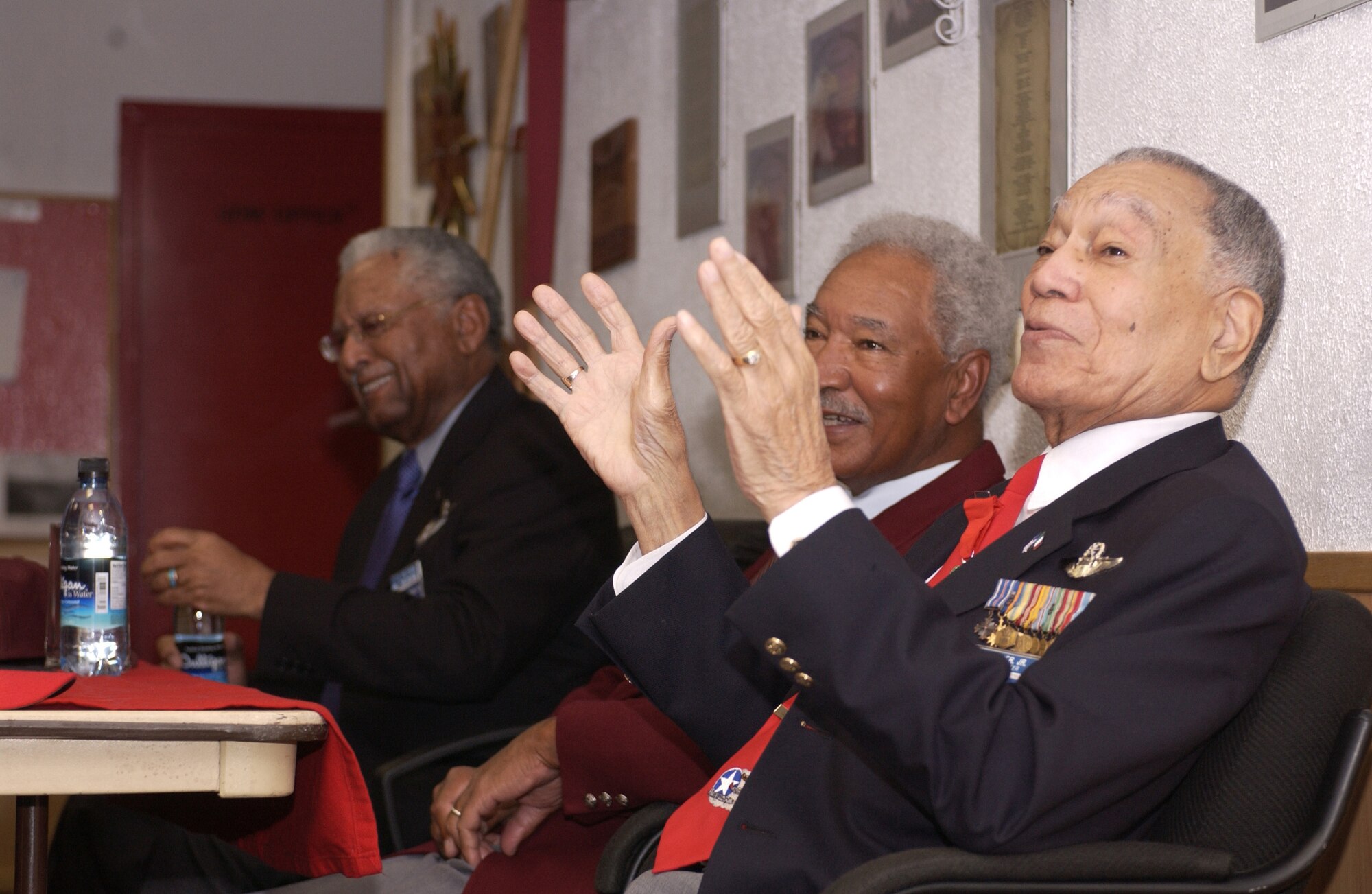 SPANGDAHLEM AIR BASE, Germany (AFPN) -- Retired Lieutenant Colonels (right to left) Lee Archer, Robert Ashby and Asa Herring, members of the original Tuskegee Airmen, visit the 52nd Aircraft Maintenance Squadron. The Tuskegee Airmen visited the base Feb. 21 as part of the celebration of African-American History Month. (U.S. Air Force photo by Senior Airman Kristin Ruleau)