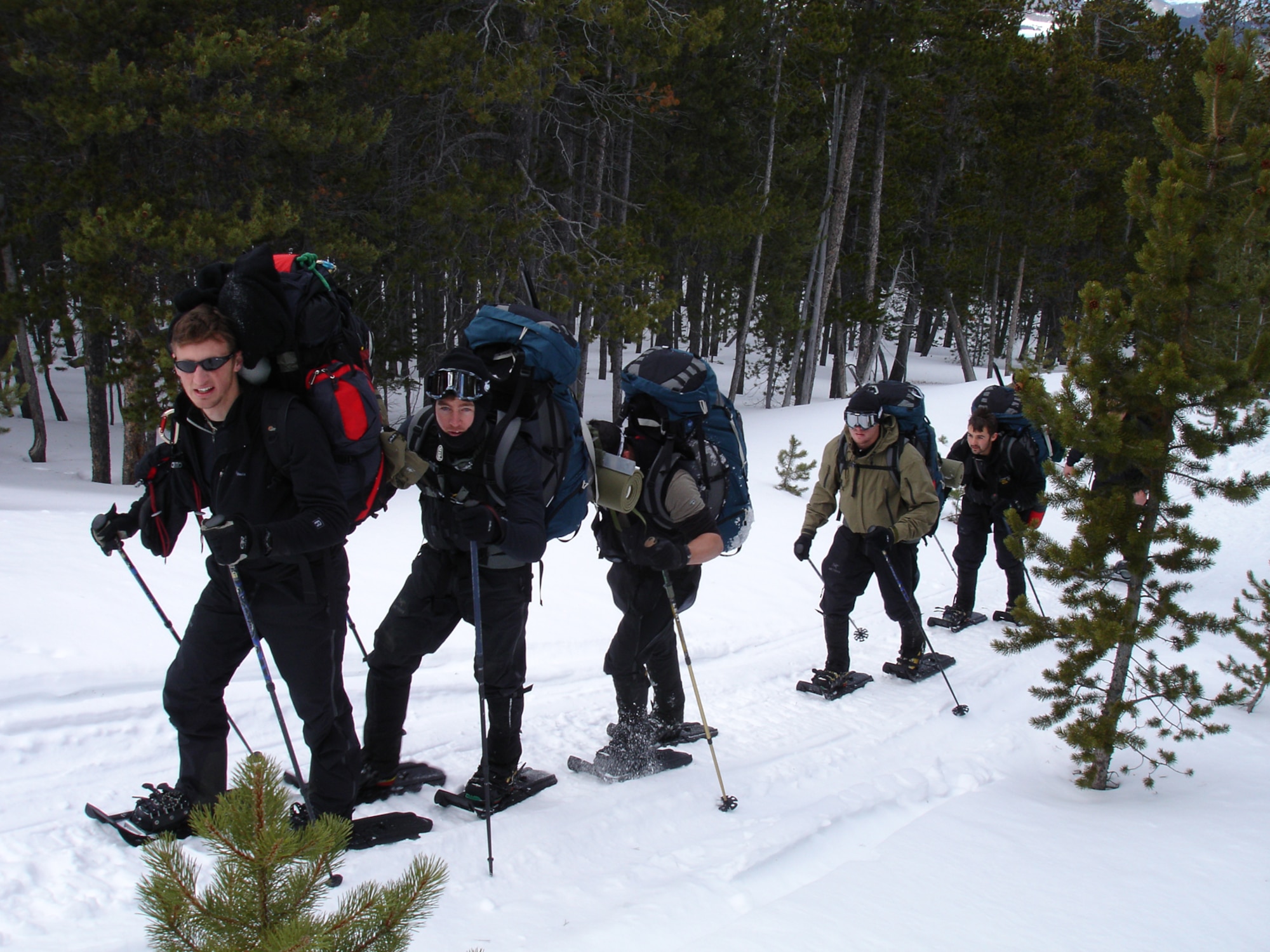 BUTTE, Mont. - Airmen from 38th Rescue Squadron at Moody Air Force Base, Ga., cross-country ski in the mountainous terrain during high altitude, combat search and rescue training here, last month. The training taught the Airmen different rescue techniques in elevated terrain and harsh environments to prepare for future deployments. (Courtesy photo)                          
