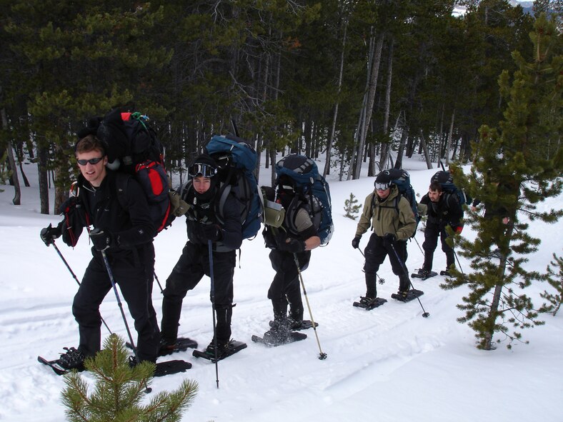 BUTTE, Mont. - Airmen from 38th Rescue Squadron at Moody Air Force Base, Ga., cross-country ski in the mountainous terrain during high altitude, combat search and rescue training here, last month. The training taught the Airmen different rescue techniques in elevated terrain and harsh environments to prepare for future deployments. (Courtesy photo)                          