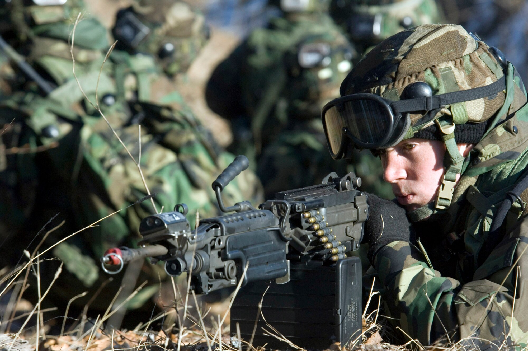 BAUMHOLDER, Germany (AFPN) -- Airman 1st Class Robert Spears provides cover for his squad during foot patrol training.  Airman Spears is a security force specialist with the 52nd Security Forces Squadron at Spangdahlem Air Base, Germany. He participated in Creek Defender in southwestern Germany earlier this month. (U.S. Air Force photo by Master Sgt. John E. Lasky)