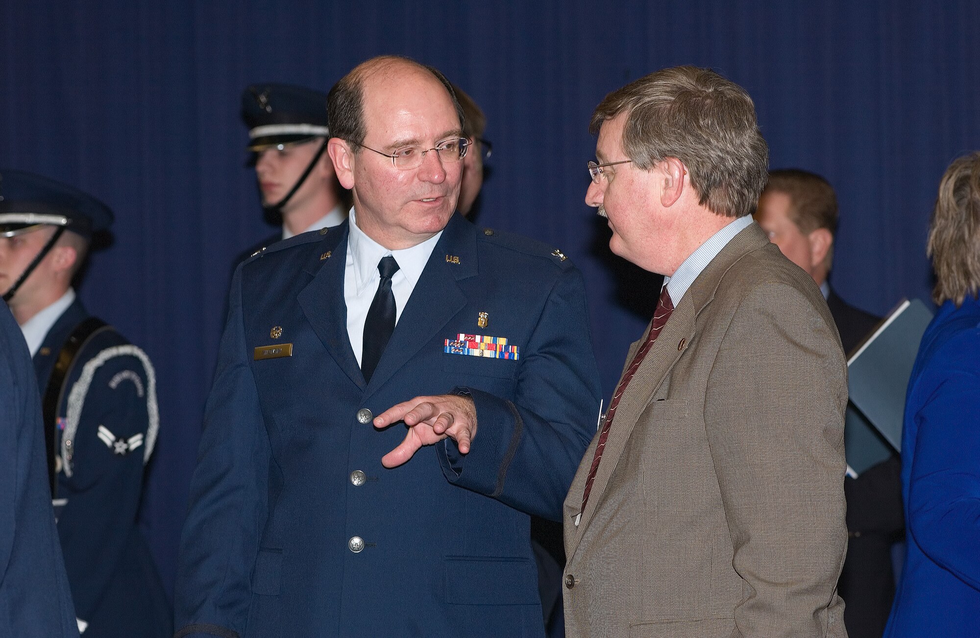 Col. Jeffrey Hilovsky, 512th Aerospace Medicine Squadron commander, interacts with his honorary commander, Delaware State Senator Gary Simpson, at Dover Air Force Base's Honorary Commander Induction Ceremony at The Landings Club Feb. 17. The Honorary Commander program is in its 15th year and provides an opportunity for civilian and military leaders to exchange ideas and foster a better understanding of each other's function in the community.