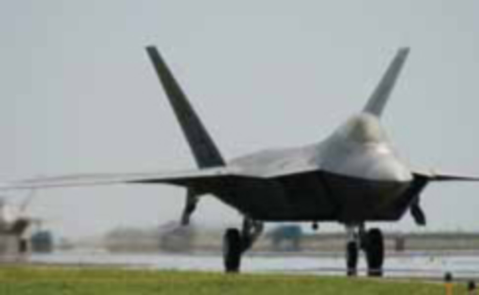 An F-22A Raptor taxis down the runway. This year's $1.3
billion military construction request, as part of the president's
fiscal year 2007 budget plan, is the largest in the
last 15 years and includes projects for new mission beddowns
like the F-22A Raptor.