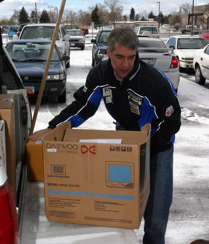 Mr. Jacques Bazinet, helps unload food, clothes, letters and other items given to the 419th Fighter Wing by the Southwest Grandview neighborhood in Provo, UT. The Provo community spent two weeks collecting donations and writing 300 letters to Members of 419th Fighter Wing deployed to Iraq. Mr. Bazinet coordinated the project with Stacia Leichty, who is a member of the Grandview neighborhood and daughter of Staff Sgt. Faron Young, a Vehicle Ops Journeyman from the 419th Combat Logistics Support Squdadron currently deployed with the 419th FW. (Photo by Senior Airman Nathan Greer)