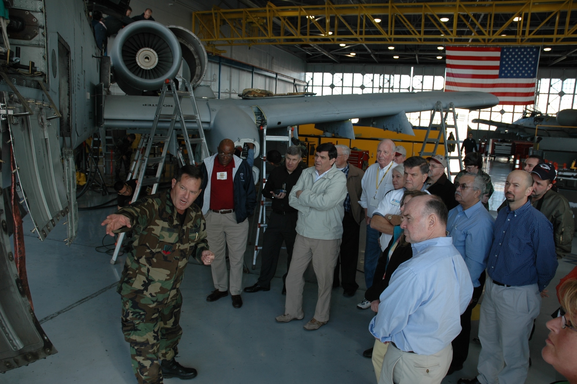 Senior Master Sgt. Benjamin Hoover, 355th Fighter Wing, explains maintenance for an A-10 Thunderbolt II for 26 civic leaders at Davis-Monthan Air Force Base, Ariz., Feb. 16. Sergeant Hoover's briefing was among those included in a base tour and the civic leaders' visit to the nearby famous "boneyard." 

