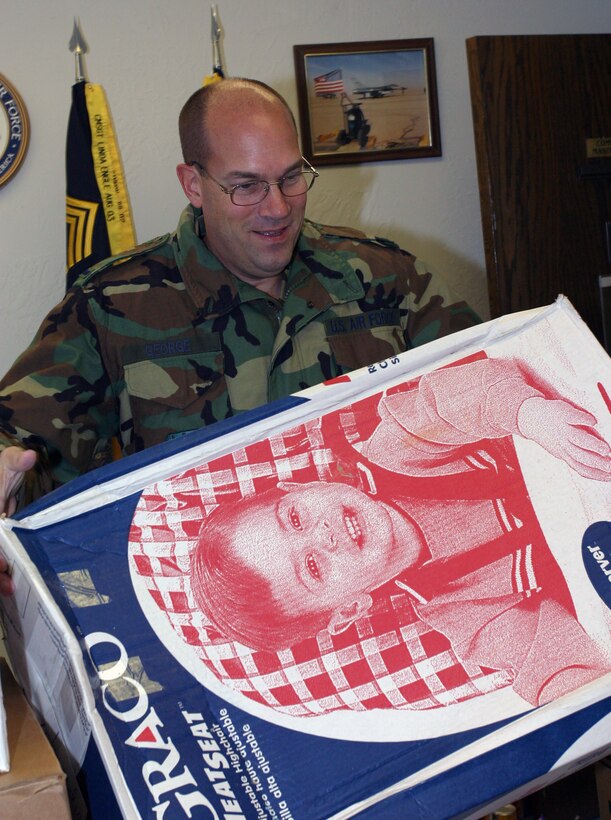 1st Lt. Dale George, a Hospital Administrator in the Medical Squadron helps unload food, clothes, letters and other items given to the 419th Fighter Wing by the  Southwest Grandview neighborhood in Provo, UT. The Provo community spent two weeks collecting donations and writing 300 letters to Members of 419th Fighter deployed to Iraq. The Project was coordinated with the help of Stacia Leichty, who is a member of the Grandview neighborhood and daughter of Staff Sgt Faron Young, a Vehicle Ops Journeyman from the 419th Combat Logistics Support Squadron currently deployed with the 419th FW. (Photo by Senior Airman Nathan Greer)