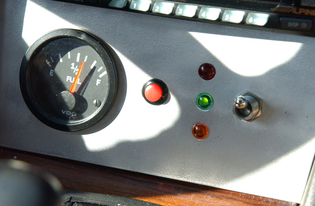 This customized panel controls the vegetable oil system. The green light indicates that the engine is running on the oil.