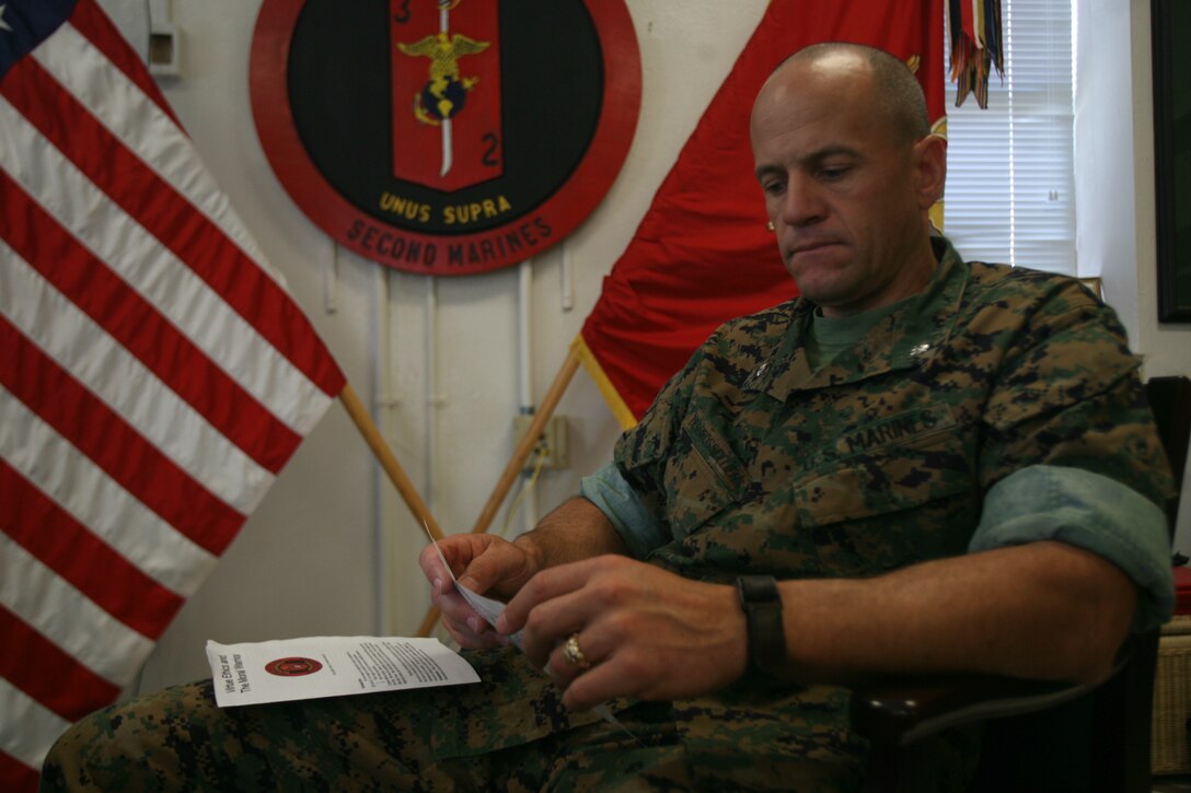 After a visit from Gen. Michael W. Hagee, Commandant of the Marine Corps, Lt. Col. Todd S. Desgrosseilliers, battalion commander for 3rd Battalion, 2nd Marine Regiment, overlooks the Ethics Card and Pillars Card June 2. Desgrosseilliers implemented the cards earlier this year as a way to reinforce corps values within his battalion. Desgrosseilliers will deploy to Iraq with his unit next month.