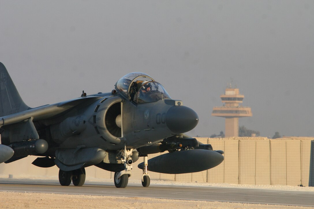 Major William R. Sauerland, a pilot with the Bulldogs of Marine Attack Squadron 223, taxis toward a '223 hangar after completing a flight mission, Jan. 3, at Al Asad, Iraq.