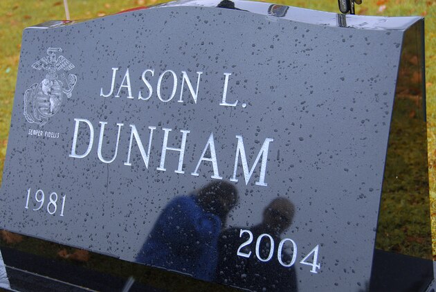 SCIO, N.Y. - Parents Deb and Dan Dunham visit their son?s grave Nov. 3 at Fairlawn Cemetery in Scio, N.Y.