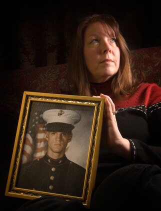 SCIO, N.Y. - Deb Dunham holds the boot-camp picture of her son, Cpl. Jason L. Dunham.