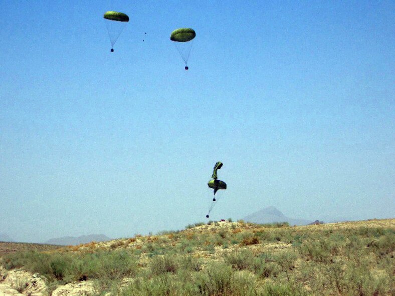 AFGHANISTAN (AFPN) -- The Air Force airdropped 5,400 pounds civic aid near Kandahar, Afghanistan. During 2005, more than 578,000 pounds of civic aid and nearly 1.3 million pounds of troop resupply were airdropped in Afghanistan. (U.S. Air Force photo)