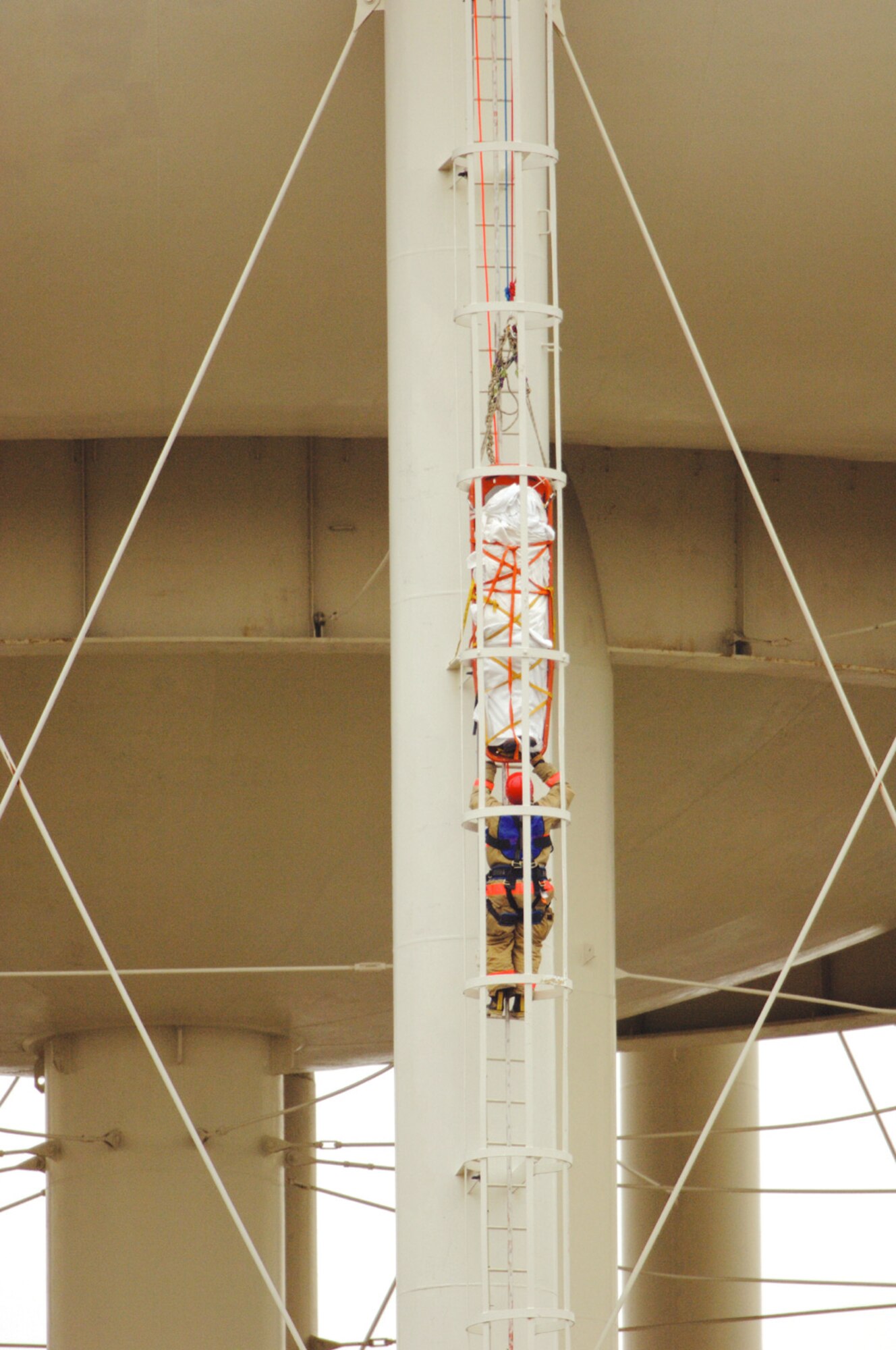 ANDREWS AIR FORCE BASE, Md. (AMCNS) -- Andrews Air Force Base and Prince George’s County firefighters rescued a man from atop a 200-foot water tower here Dec. 5. (Photo by Tech. Sgt. Tracy L. DeMarco)