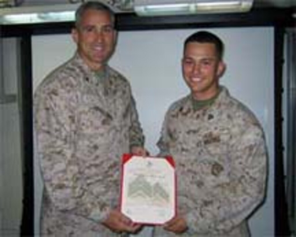 Sergeant Christopher L. Stinnett was meritoriously promoted to his current rank by Colonel Ronald J. Johnson, commanding officer of the 24th Marine Expeditionary Unit.  The ceremony was held May 5, aboard USS Iwo Jima while participating in the 24th MEU's Certification Exercise.  Cpl Stinnett is a member of Marine Medium Helicopter Squadron 365 (reinforced), the Aviation Combat Element of the 24th MEU.