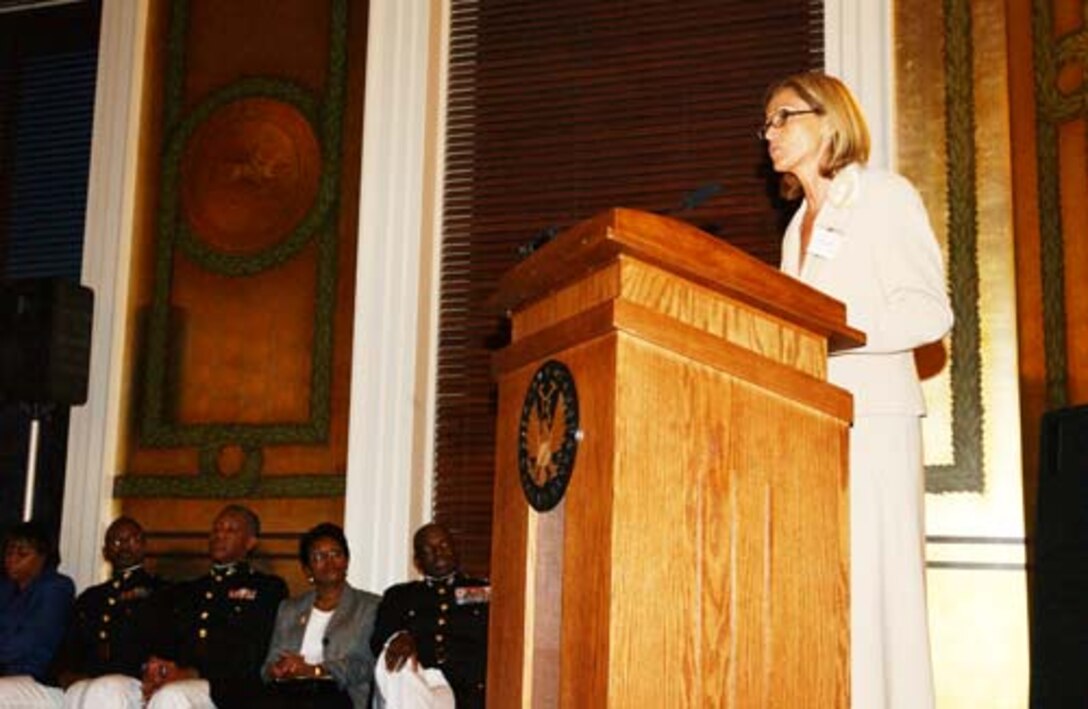 Angela E. Zavala, editor, TIYM Publishing Company, Inc., addresses the crowd during the 2006 TIYM African American Yearbook reception at the Library of Congress April 6. This is the sixth year the Marine Corps has advertised in the publication, which provides a wide range of resource and referral information about the African American community.