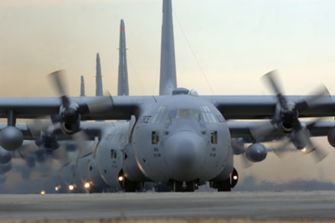 U.S. Air Force C-130 Hercules aircraft taxi on the flight line before a six-ship sortie from Yokota Air Base, Japan, on Jan. 6, 2006. The Hercules are attached to the 36th Airlift Squadron, which is the only forward-based tactical airlift squadron in the Pacific region. 