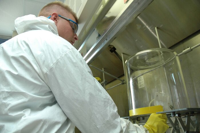 SUFFIELD, CANADA--Cpl. Joshua D. Genrich, Company B, Chemical Biological Incident Response Force, II Marine Expeditionary Force, utilizes the M256A1 chemical detection kit to determine what type of chemical warfare agent is present during a chemical class taught at the Counter Terrorism Technology Center, Defense Research and Development Center, Sept. 6.  The course, focused on the methods used to detect chemical agents, is designed to instill confidence in first responders and military personnel who may have to operate in an environment contaminated by CWAs following a weapons of mass destruction attack.