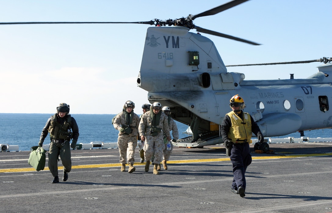 Lt. Col.  Robert S. Barr, commanding officer of Marine Medium Helicopter Squadron 365, arrives aboard USS Iwo Jima to participate in the Group Sail exercise.::n::HMM-365 is the Aviation Combat Element of the 24th Marine Expeditionary Unit.  The 24th MEU is scheduled to deploy in the spring with the seven vessels of the Iwo Jima Expeditionary Strike Group. The Marines’ mission and destination have yet to be determined.::n::