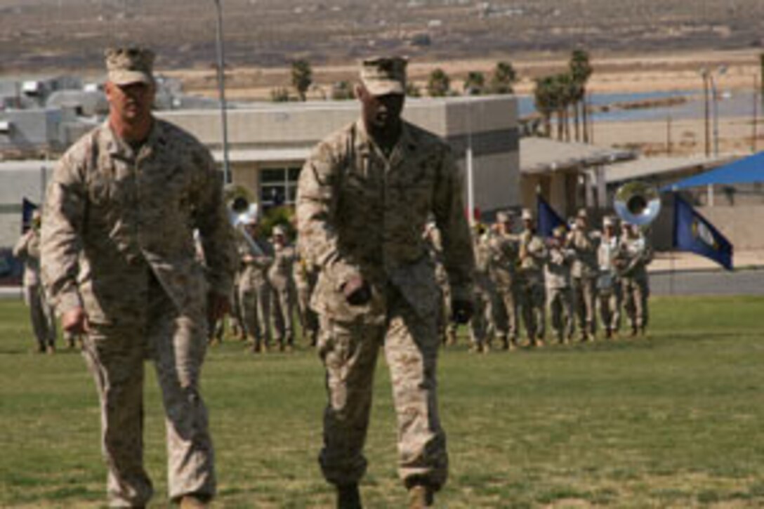 Maj. Gen. Tariq Abdul Wahab Jasim, commanding general of the 1st Iraqi Army Division, speaks with Iraqi soldiers at Camp Habbaniyah upon their return to duty. The defense ministry offered dispensation to those who went AWOL, attracting entire families back to the fighting forces. ?The fact that they came back on their own volition shows that they want to serve,? said Col. Juan Ayala, senior advisor to the 1st Iraqi Army Division. ?It?s going to give this division a much needed influx of soldiers.?