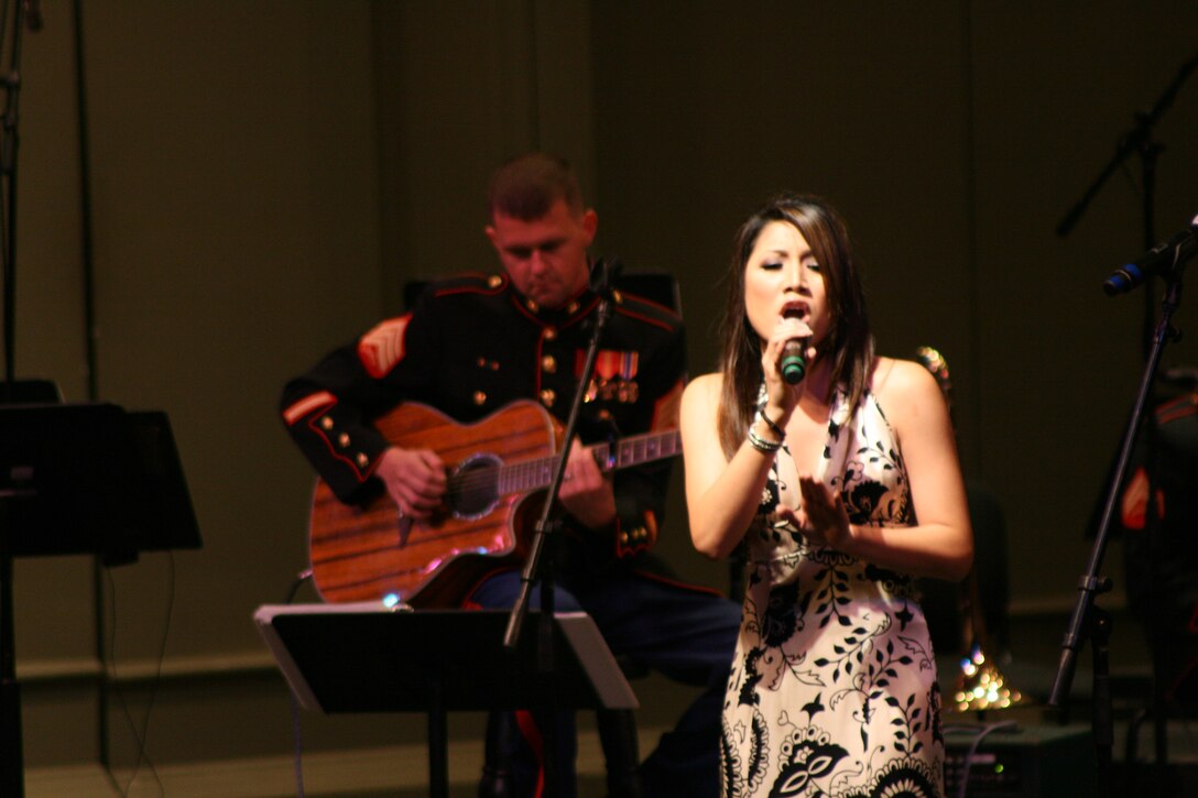 Jasmine Trias, third-place winner on season three of American Idol, sings at the Na Mele o na Keiki, 'Music for the Children' concert at the Neal S. Blaisdell Concert Hall Dec 10. This was the first year for such a concert that featured other talents from Chris Vandercook, the Honolulu Boy Choir, Anita Hall and Jake Shimabukuro, performing with the U.S. Marine Corps Forces, Pacific Band to support Toys for Tots.