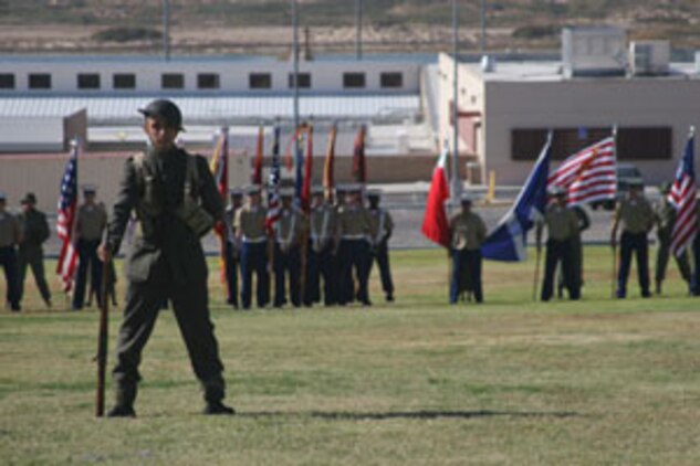 Cpl. Jose Sepulveda stands before the pageant ceremony crowd as a Marine from 1918.