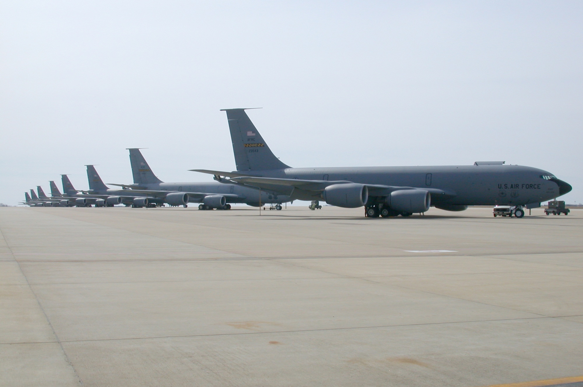 Eight KC-135s are on the flightline at the Air Force Reserve Command's 459th Air Refueling Wing at Andrews Air Force Base, Md, awaiting their next mission. 