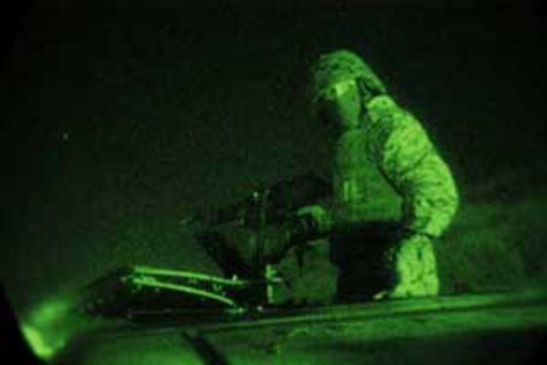 CAMP PENDLETON, Calif. (Apr. 11, 2006) --    Marines from 5th Battalion 11th Marine Regiment were tasked with providing security and processing American citizens during the Non-combatant Evacuation Operation Exercise at the 52 area combat town here.  5/11 participated in the NEO in support of the 15th Marine Expeditionary Unit during its MEUEX. MEUEX is a series of exercises designed to prepare the 15th MEU for the planned deployment this fall.