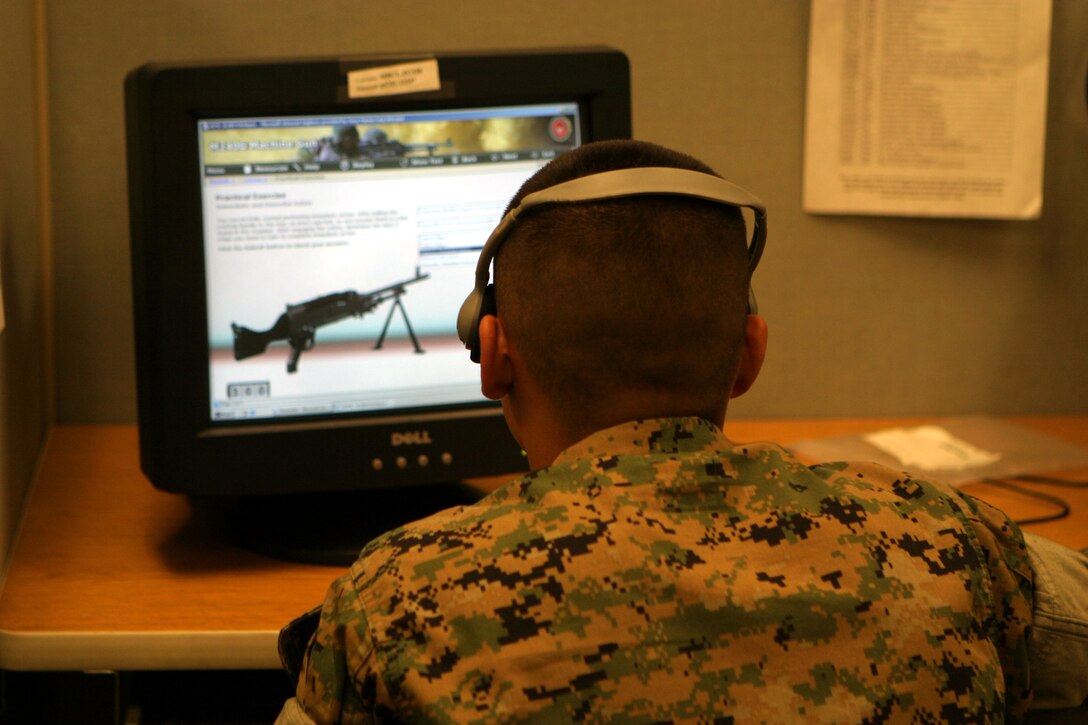 MARINE CORPS BASE CAMP LEJEUNE, N.C. (May 12, 2006)- Marines with 3rd Battalion, 10th Marine Regiment take an online machine gun course. The course was good because all the Marines get the same training (Official U.S. Marine Corps photo by Cpl. Lucian Friel (RELEASED)