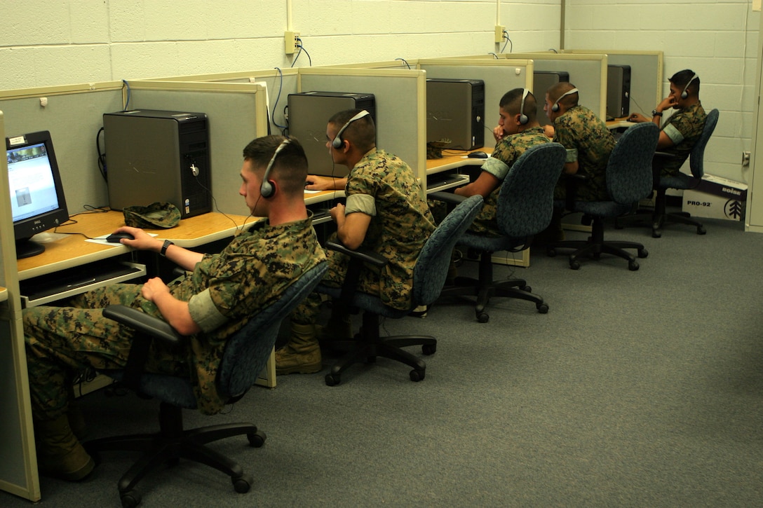 MARINE CORPS BASE CAMP LEJEUNE, N.C. (May 12, 2006)- Marines with 3rd Battalion, 10th Marine Regiment take an online machine gun course. The course was good because all the Marines get the same training (Official U.S. Marine Corps photo by Cpl. Lucian Friel (RELEASED)
