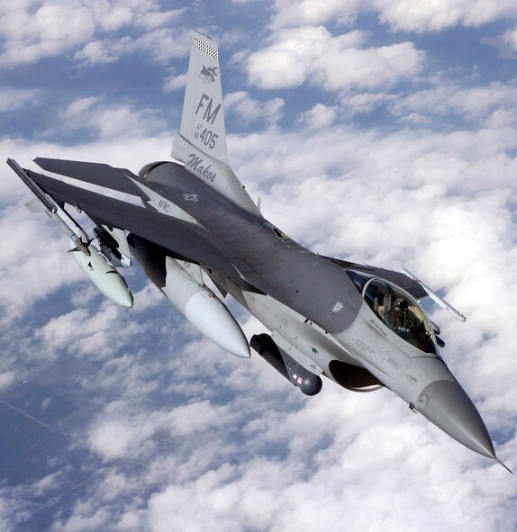 An F-16 Fighting Falcon 'Mako' from Air Force Reserve Command's 93rd Fighter Squadron flies through the skies of South Florida after completing a training exercise at Hill AFB, Utah (U.S. Air Force Reserve photo by Bucky Parrish).