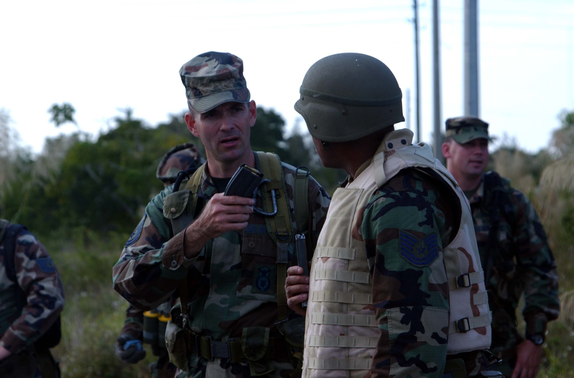 An instructor-trainer from the 482nd Security Forces Squadron debriefs a trainee after a tactical convoy exercise at Homestead ARB, Fla., on Dec. 17.  The purpose of the training was to prepare troops for a variety of possible combat scenarious if and when they deploy (U.S. Air Force Reserve photo by Jake Shaw).
