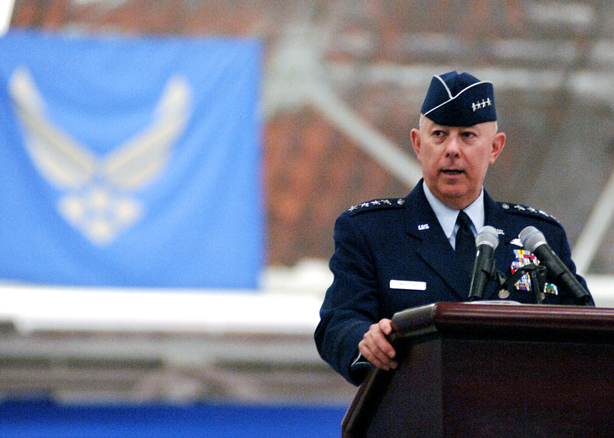 ANDREWS AIR FORCE BASE, Md. (AFPN) -- Air Force Chief of Staff Gen. T. Michael Moseley presides over a ceremony welcoming Secretary of the Air Force Michael W. Wynne into the blue today.  Secretary Wynne assumed the duties as the 21st secretary of the Air Force in November 2005. (U.S. Air Force photo by Staff Sgt. Dennis J. Henry Jr.) 