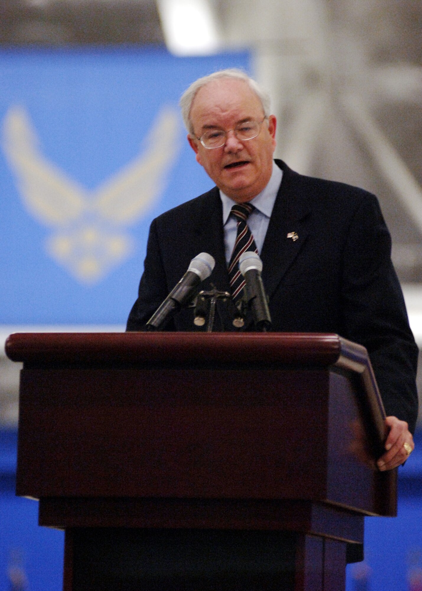 ANDREWS AIR FORCE BASE, Md. (AFPN) -- Secretary of the Air Force Michael W. Wynne is "welcomed into the blue" during a ceremony here today.  He assumed the duties as the 21st secretary of the Air Force in November 2005. (U.S. Air Force photo by Staff Sgt. Dennis J. Henry Jr.)