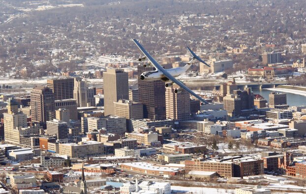 A C-141 aircraft, known as the Hanoi Taxi, flies over the city of Dayton, Ohio.  The aircraft will be the last C-141 in the Air Force inventory to retire.  The aircraft will be placed in the National Museum of the United States Air Force on May 6, 2006. (U.S. Air Force Reserve photo by Maj. Ted Theopolos)