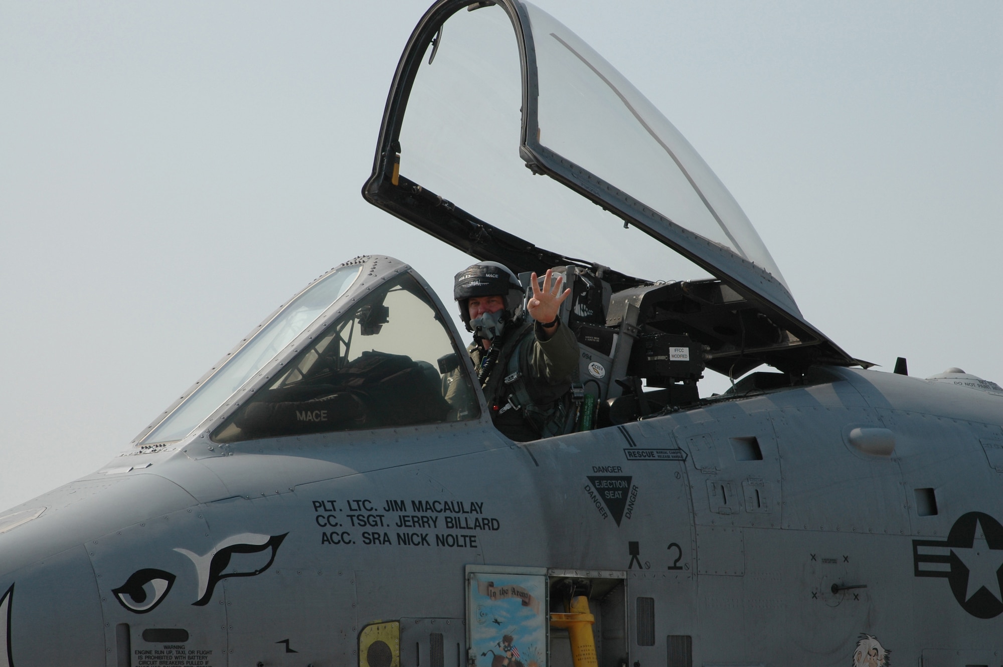 Lt. Col. Jimbo Macaulay, 47th Fighter Squadron operations officer, holds up four fingers upon landing Thursday, Sept. 1, after crossing his 4,000-hour mark in the A-10. (Photos
by Tech. Sgt. Sherri Savant)