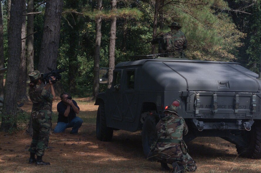 Combat camera from Hill Air Force Base, Utah films the 916th Air Refueling Wing Security Forces during their unit training assembly. The combat camera team is assigned to create a new wing mission video for the Air Force Reserve Command unit. The 916th ARW is located at Seymour Johnson Air Force Base and is North Carolina's only Air Force Reserve unit. U.S. Air Force photo by Ms. Donna Lea,