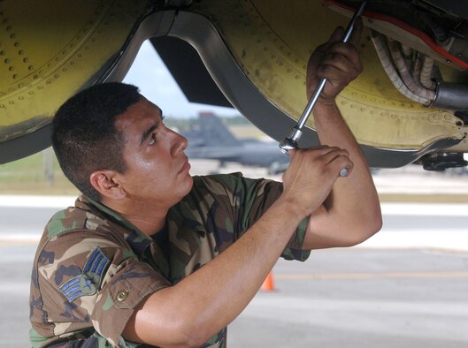 ANDERSEN AIR FORCE BASE, Guam (AFPN) -- Senior Airman Raymond Gomez changes the anti-ice valve on a B-52 Stratofortress aircraft engine. Airman Gomez is a jet engine mechanic with the 2nd Maintenance Squadron at Barksdale Air Force Base, La. (U.S. Air Force photo by Master Sgt. Val Gempis)