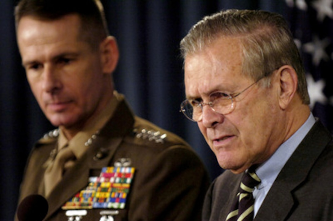 Secretary of Defense Donald H. Rumsfeld answers a reporter's question during a press briefing in the Pentagon on Jan 12, 2006. Chairman of the Joint Chiefs of Staff Gen. Peter Pace, U.S. Marine Corps, joined Rumsfeld in briefing reporters on the progress of operations in Iraq and the global war on terrorism. 