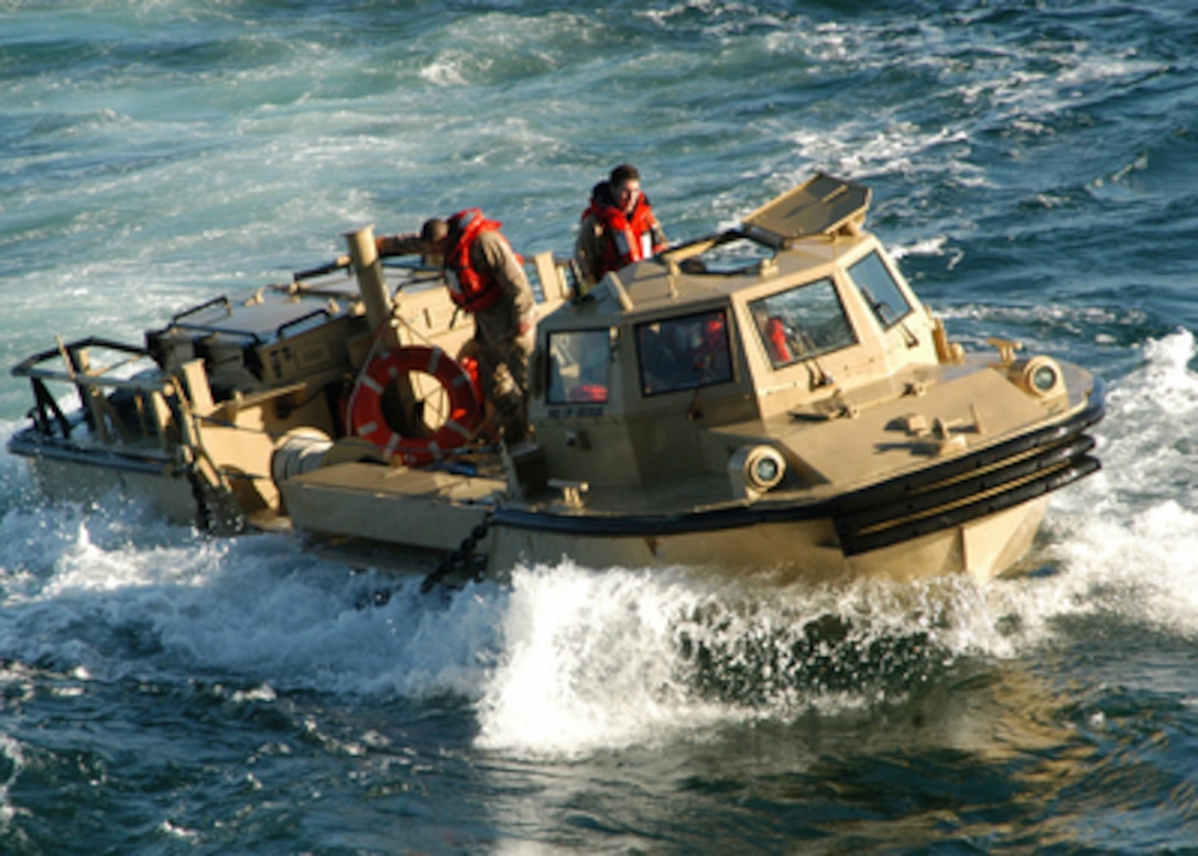 A Navy Lighter, Amphibious Resupply, Cargo vehicle, more commonly know as a LARC, heads toward the well deck of the USS Iwo Jima (LHD 7) after performing amphibious exercises in the Atlantic Ocean on Jan. 9, 2006. The LARC and its crew are attached to Beach Master Unit 2 from Naval Amphibious Base Little Creek, Va. 