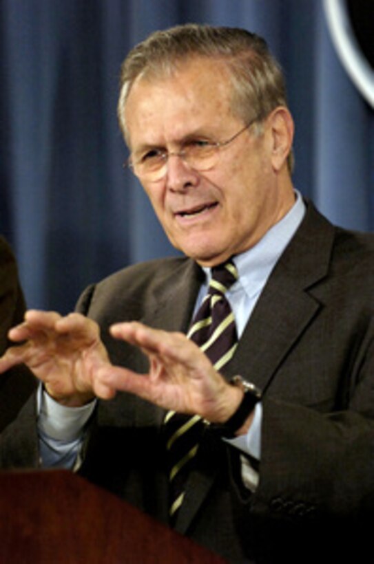 Secretary of Defense Donald H. Rumsfeld answers a reporter's question during a press briefing in the Pentagon on Jan 12, 2006. Chairman of the Joint Chiefs of Staff Gen. Peter Pace, U.S. Marine Corps, joined Rumsfeld in briefing reporters on the progress of operations in Iraq and the global war on terrorism. 