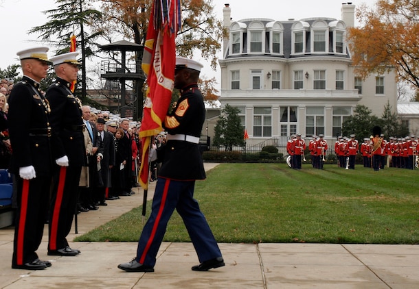 MARINE BARRACKS WASHINGTON ? Sgt. Maj. John L. Estrada, 15th Sergeant Major of the Marine Corps, walks toward Gen. Michael W. Hagee and Gen. James T. Conway with the Marine Corps Battle Colors during the passage of command ceremony Nov. 13.
