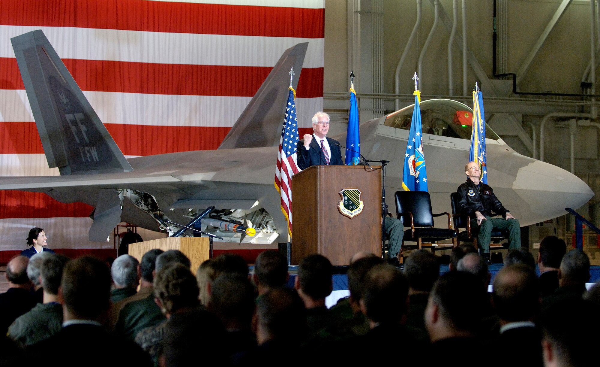 LANGLEY AIR FORCE BASE, Va. (AFPN) -- "We did it!" Ralph D. Heath tells the crowd gathered here today at the F-22A Raptor's initial operating capability ceremony. Mr. Heath is the executive vice president of Lockheed Martin's aeronautical division. The IOC declaration means the Air Force's fifth generation fighter is ready for war. 
(U.S. Air Force photograph by SrA Austin Knox)