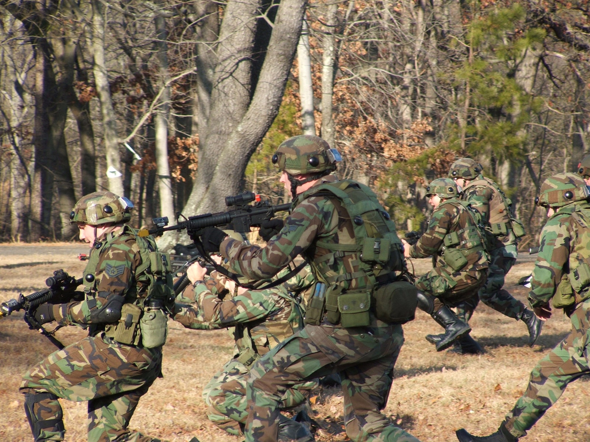 FORT DIX, N.J. (AFPN) -- Airmen in the Air Force Integrated Contingency Skills Training Course practice tactical movement here Jan. 12. More than 100 students from multiple career fields participate in the course. The course is directed and taught by the Air Mobility Warfare Center's 421st Combat Training Squadron.  (U.S. Air Force photo by Tech. Sgt. Scott T. Sturkol)